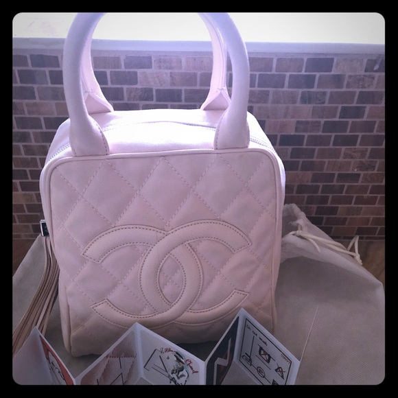 CHANEL Handbags - Chanel canvas/leather tote with tassel